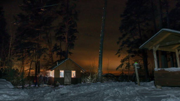 istock Wooden house in the winter forest. 1090747230