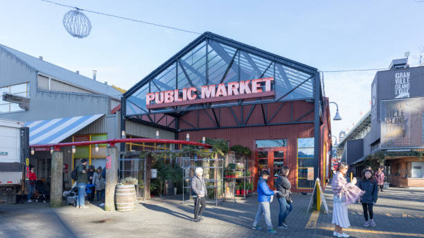 Granville Island Public Market in Vancouver. It's home to over 100 vendors offering fresh seafood, meats, sweets and European specialty foods. Vancouver, Canada - Feb 1, 2019 : Granville Island Public Market in Vancouver. It's home to over 100 vendors offering fresh seafood, meats, sweets and European specialty foods. false creek stock pictures, royalty-free photos & images