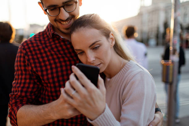 istock Couple looking at the mobile phone 1090747954