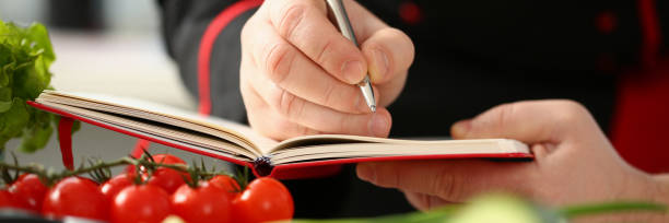 istock An open book of recipes on background 1090750094