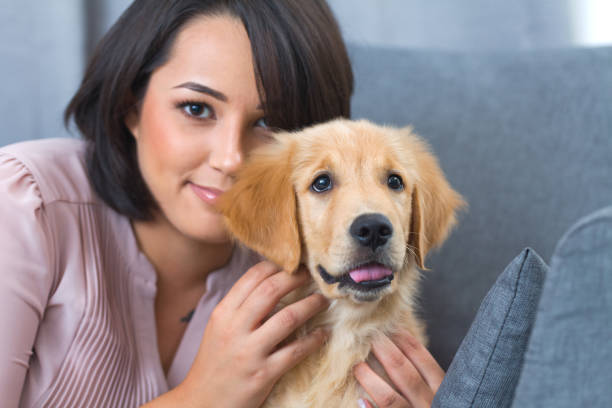 istock Young woman with her dog 1090753354