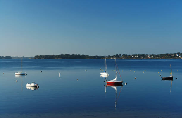istock boats and reflections in the Morbihan gulf 1090753822