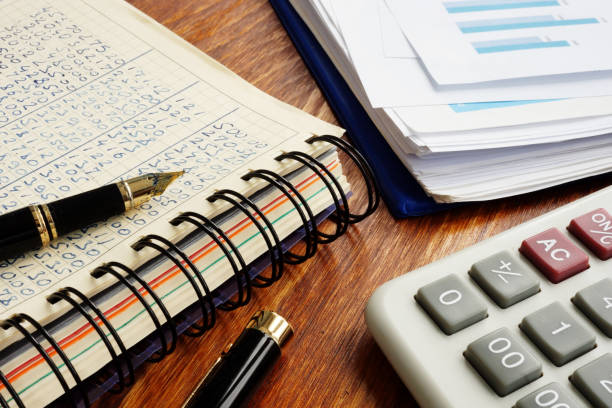 istock Small business accounting. Financial documents and pen on an office desk. 1090754100