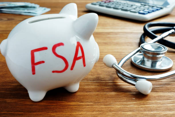 Piggy bank with words Flexible Spending Account FSA. Piggy bank with words Flexible Spending Account FSA. commercial activity stock pictures, royalty-free photos & images