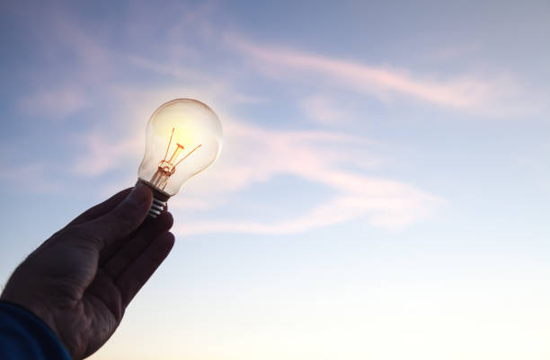istock Hand holding light bulb. Concept of inspiration and creativity 1090755338