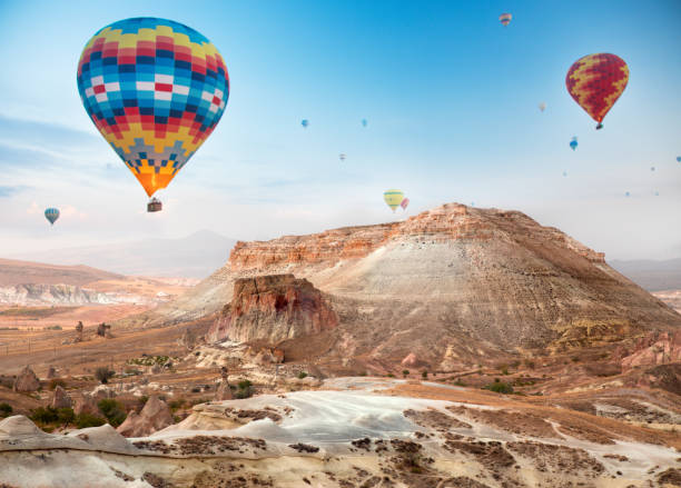 istock Hot air balloon flying over Cappadocia, Turkey 1090763904