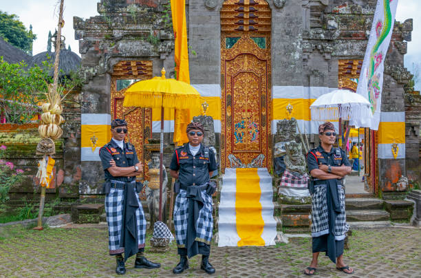 Bali, Indonesia - January 22, 2012. Balinese pilgrim at Mother Temple in Besakih on January 22, 2012 in Bali, Indonesia. Most Balinese hindus make a yearly pilgrim to the mother of all temples.
