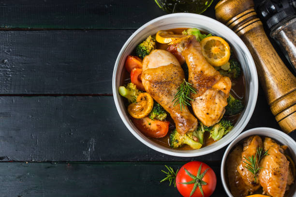istock roasted chicken legs with vegetables and herbs 1090767870