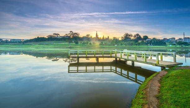 istock Sunrise on the small bridge overlooking the lake with the dramatic sky 1090781968