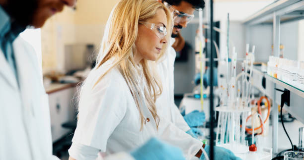 istock Attractive student of chemistry working in laboratory 1090783506