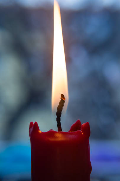 istock Close up of a red candle burning and smoking 1090783830