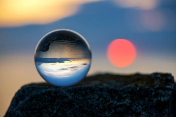 istock Upside down sunset landscape at Cape Kaliakra, Bulgaria, Eastern Europe - reflection in a lensball - selective focus, space for text 1090788696