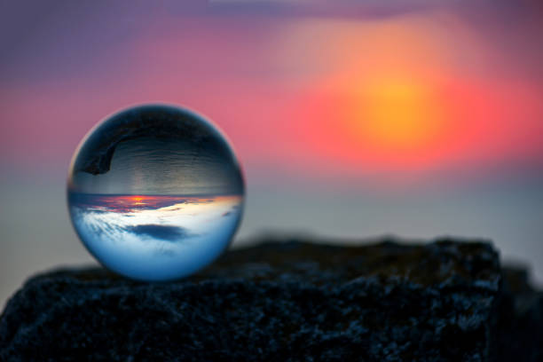 istock Upside down sunset landscape at Cape Kaliakra, Bulgaria, Eastern Europe - reflection in a lensball - selective focus, space for text 1090788698