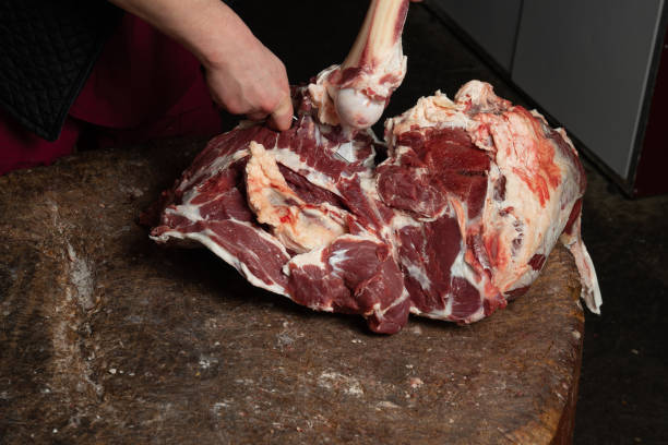 istock A butcher is cutting meat for sale 1090799794