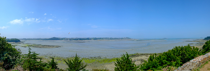 Panoramic view on the coastline in Brittany at low tide at the bay of Paimpol at the cotes d'armor.