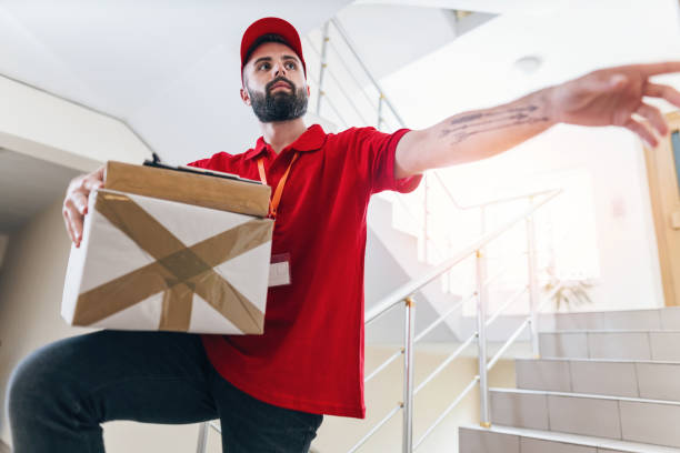 istock Delivery boy ringing on the doorbell 1090801090