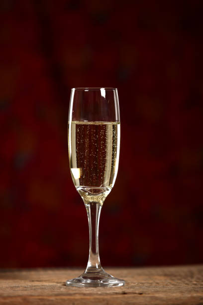 istock Champagne glass on a wooden table 1090808660