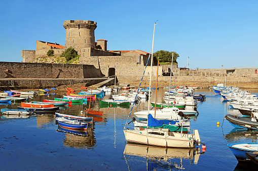 The fortress is home to the small fishing port and marina.