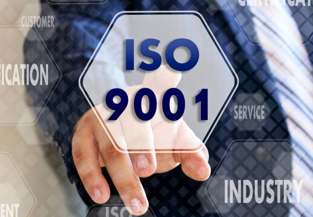 istock The businessman chooses ISO 9001,  presses a button on the touch screen 1090814990