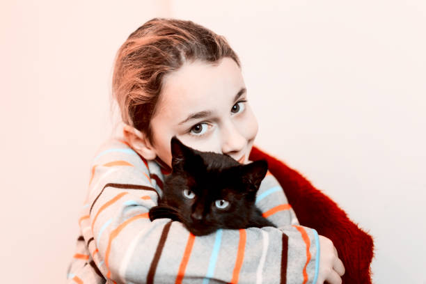 Girl Holding  Black Cat