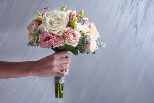 istock Wedding bouquet on with white roses on gray background in Valentine's day 1090821930