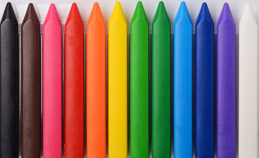 colored crayons in open box