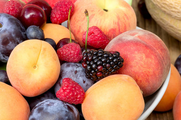 istock Fresh organic fruit in healthy diet - eating, fruit closeup 1090826604