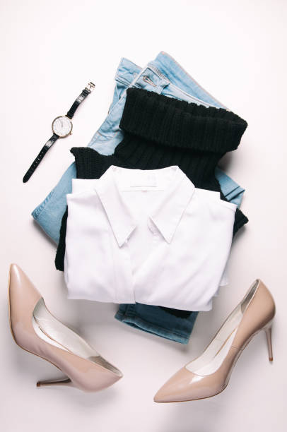 istock Women's clothing on a pale background. Flat lay and top view 1090827874