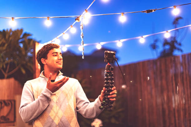 istock Young Vlogger Recording his next Vlog at the Patio 1090830070
