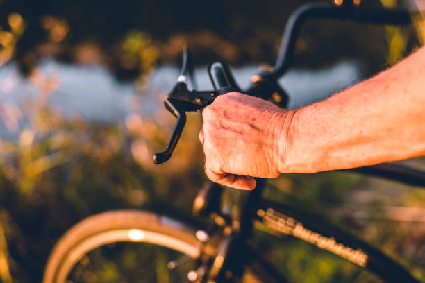 istock Hand on the steering wheels of the bicycle 1090831188