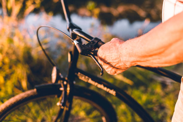 istock Hand holding the steering wheels of the bicycle 1090831274