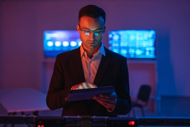 istock The businessman in glasses working with a tablet 1090835696