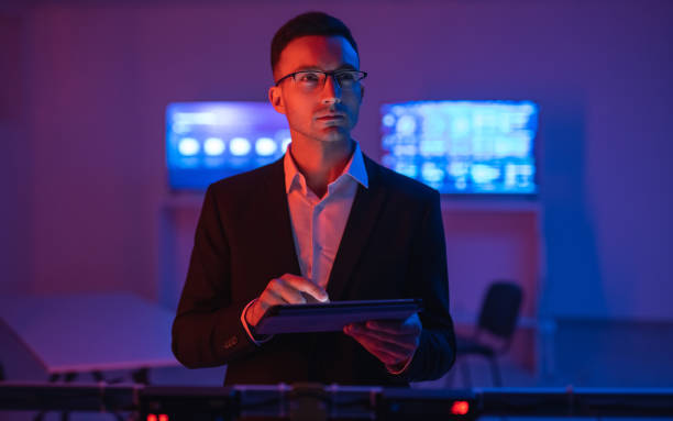 istock The businessman in glasses working with a tablet 1090835704