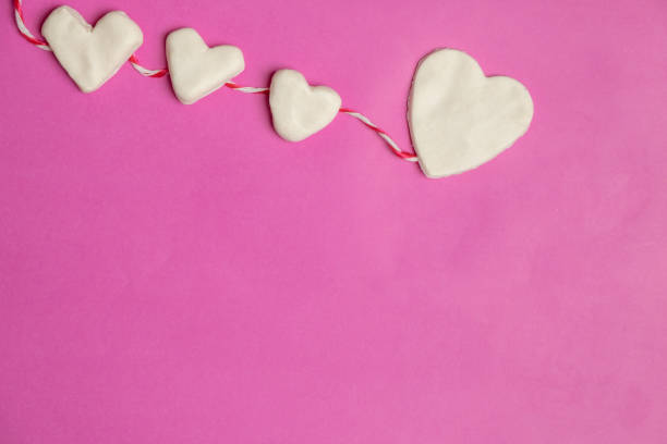 istock Big hearts on pink background with space for text, Love icon, valentine's day, relationships concept 1090846370