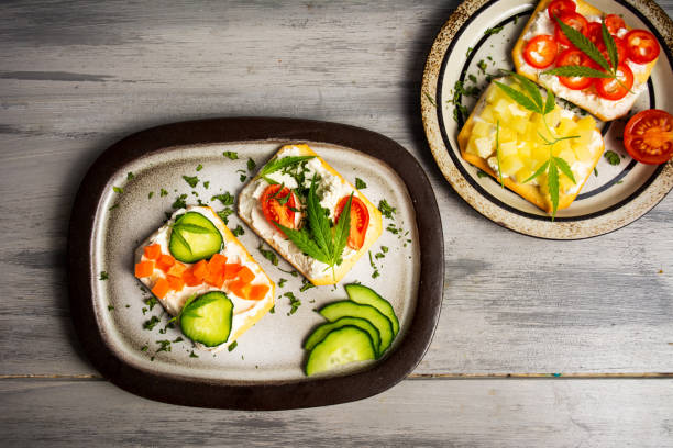 istock Sandwiches with marijuana leafs and vegetables 1090847900