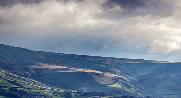 istock yorkshire pennine landscape with mist and storm clouds 1090854632