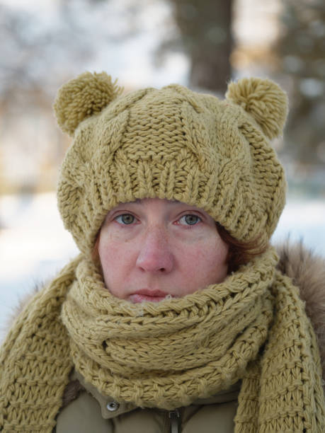 istock Woman wearing winter hat and scarf 1090858614