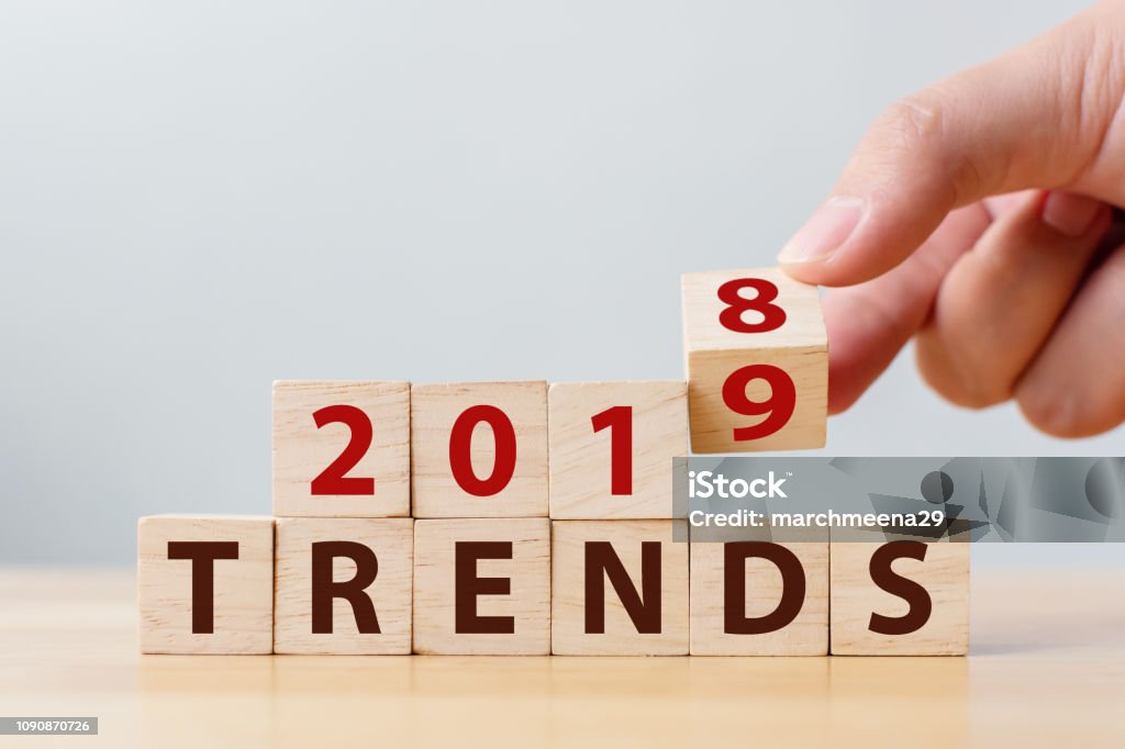 2019 trend concept. Hand flip wood cube change year 2018 to 2019 2018 Stock Photo