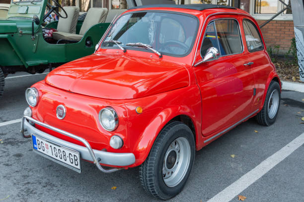 Old italian car Fiat 500 Topolino. Belgrade, Serbia-October 13, 2018: An oldtimer exhibition in the parking lot in front of the Rakovica Municipality in Belgrade, Serbia. Old italian car Fiat 500 Topolino. fiat 500 topolino stock pictures, royalty-free photos & images
