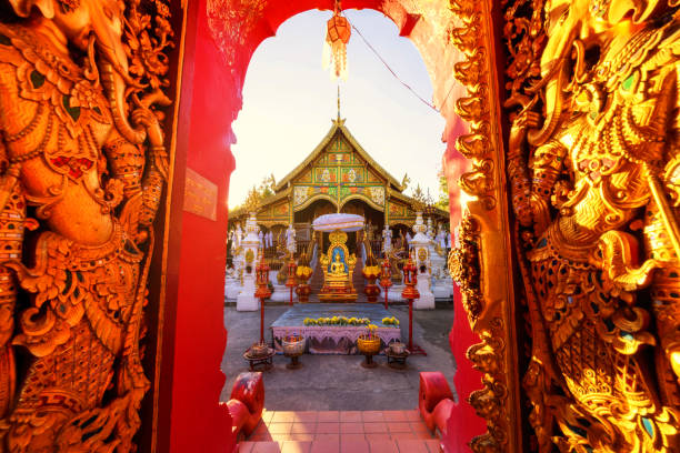istock wat Ming Muang at sunset, Chiang Rai 1090873388