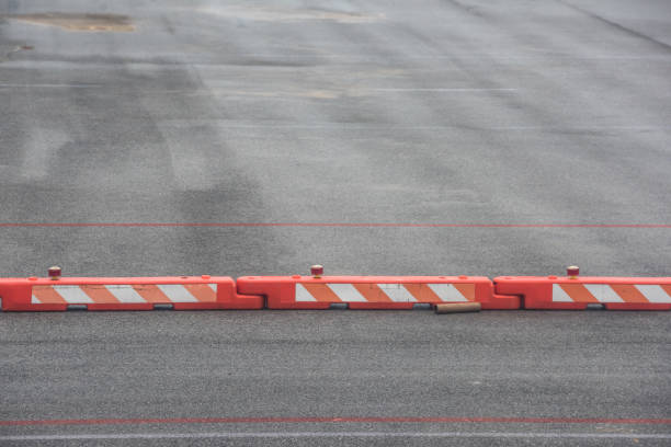 istock traffic barrier on asphalt road 1090879874