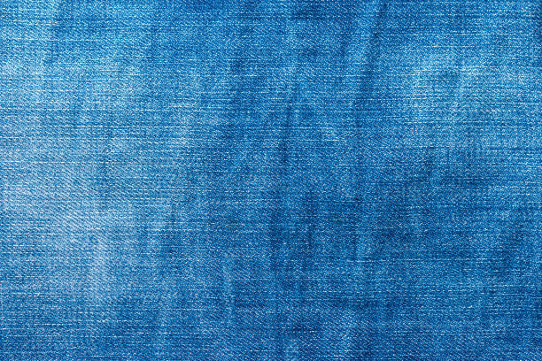 Old blue jeans. Denim Texture. Old blue jeans. Denim Texture. The background can be used for your text, advertising or website. worn jeans stock pictures, royalty-free photos & images