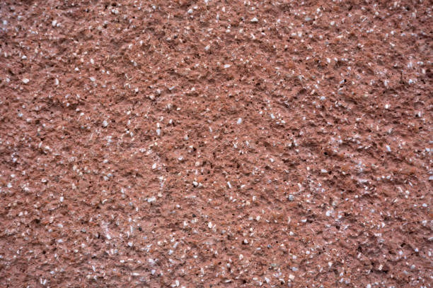 istock Red wall surface grunge background to a new . 1090888410