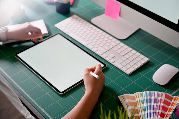 istock Graphic designer working with digital drawing tablet at her office 1090890972
