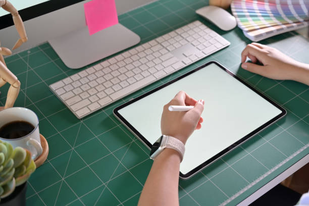 istock Graphic designer working with digital drawing tablet at her office 1090892030