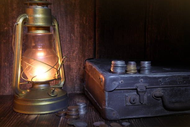 istock Treasure hunting. Ship lantern,old coins, suitcase. Marine engraving background 1090903424