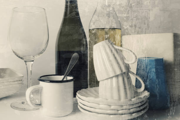 Close-up of crockery and bottles, wall in the background