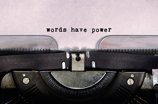 Las palabras tienen poder tipo de texto en máquina de escribir Vintage photo