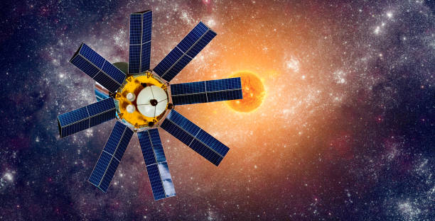 istock Space satellite orbiting the earth on a background star sun. 1090907740