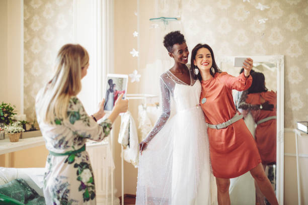 The bride is trying out her wedding dress